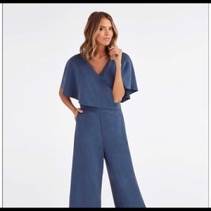 Vetta capsule cape jumpsuit in washed navy